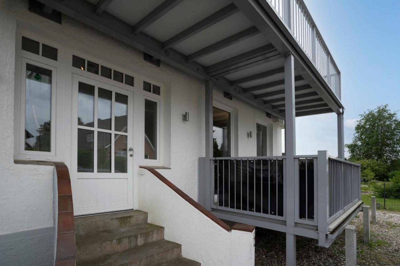 Appartement Haus Waldfrieden Ferienhaeuschen Waldfrieden à Haffkrug Extérieur photo