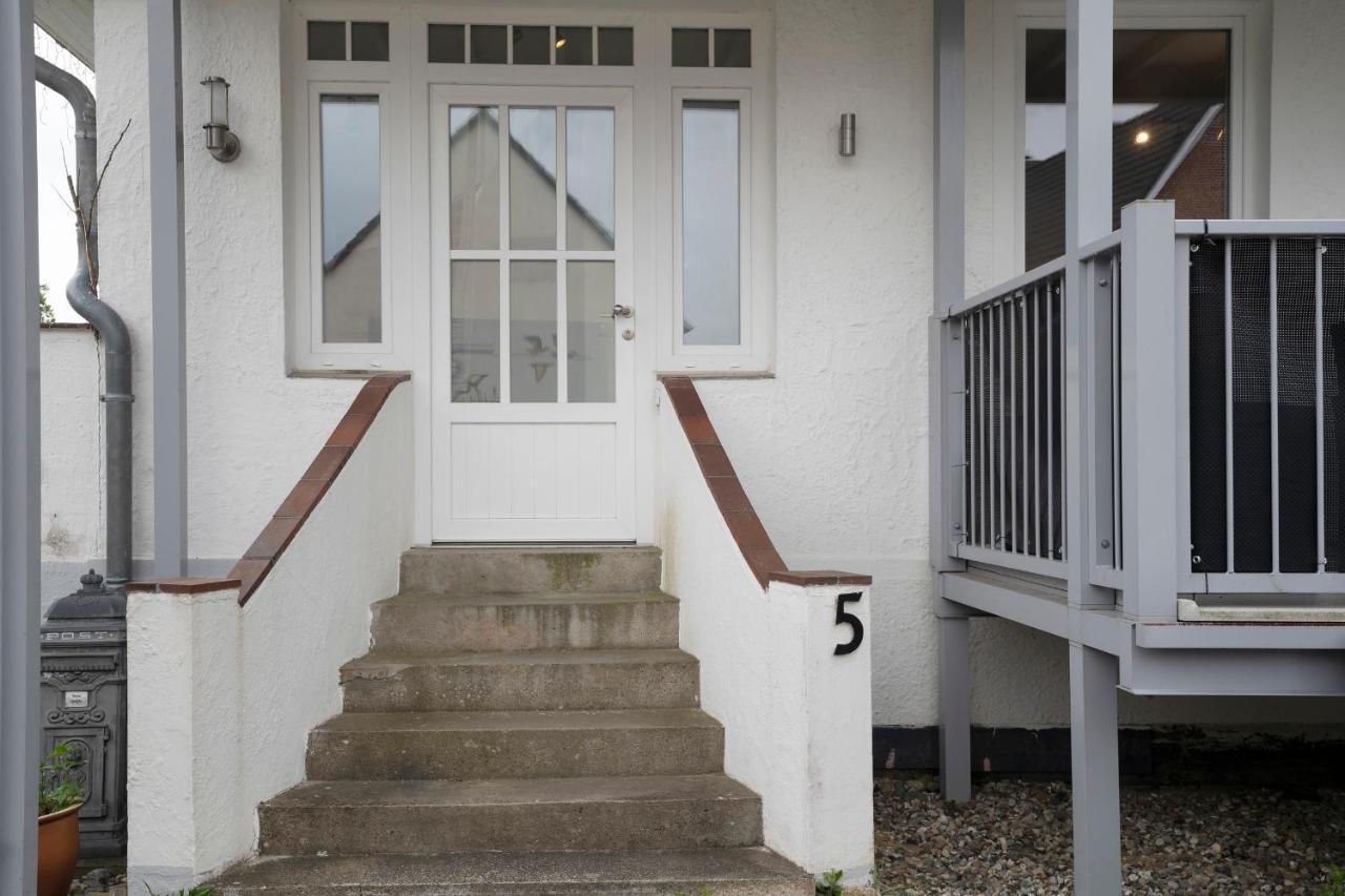 Appartement Haus Waldfrieden Ferienhaeuschen Waldfrieden à Haffkrug Extérieur photo