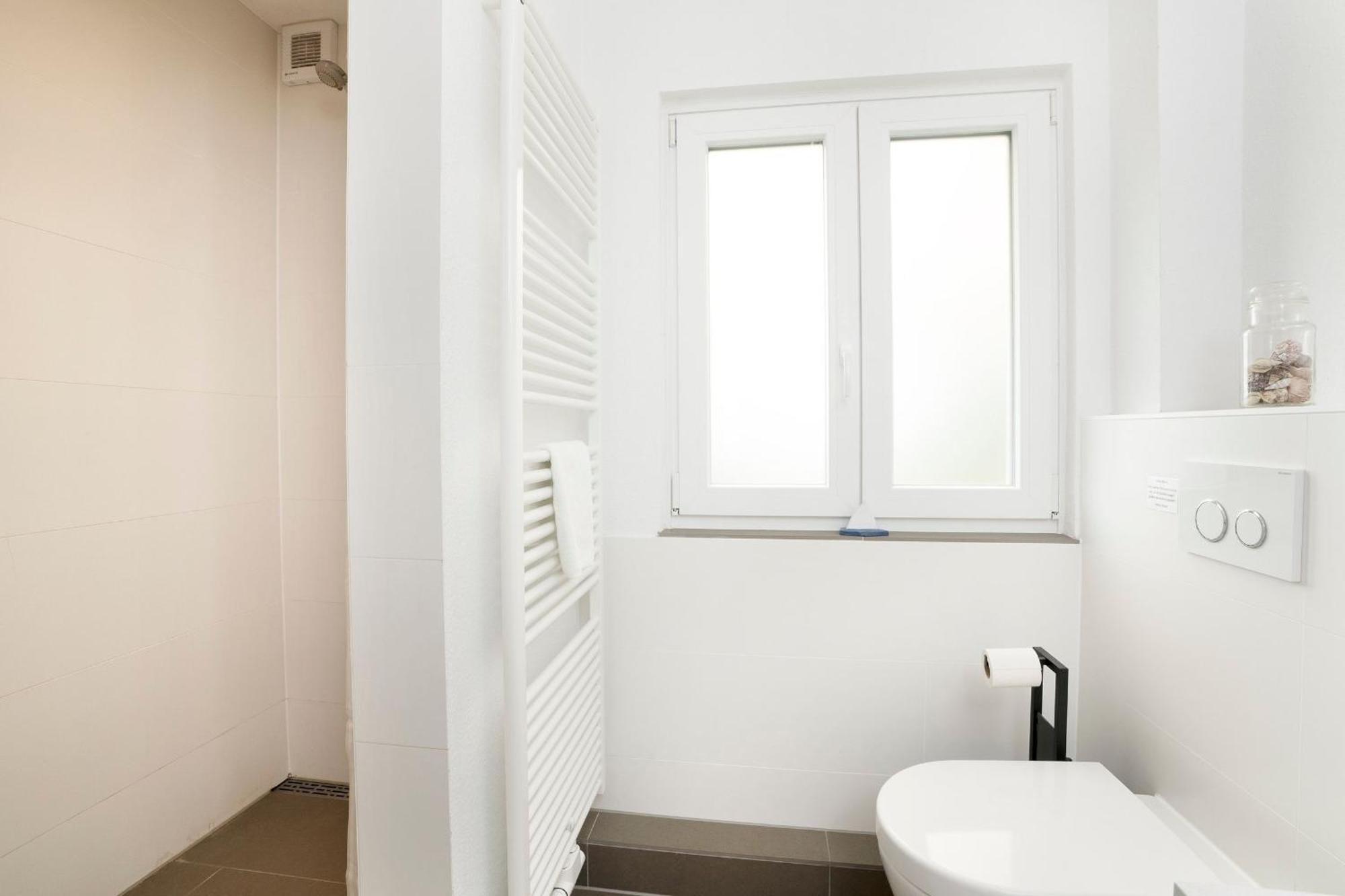 Appartement Haus Waldfrieden Ferienhaeuschen Waldfrieden à Haffkrug Extérieur photo