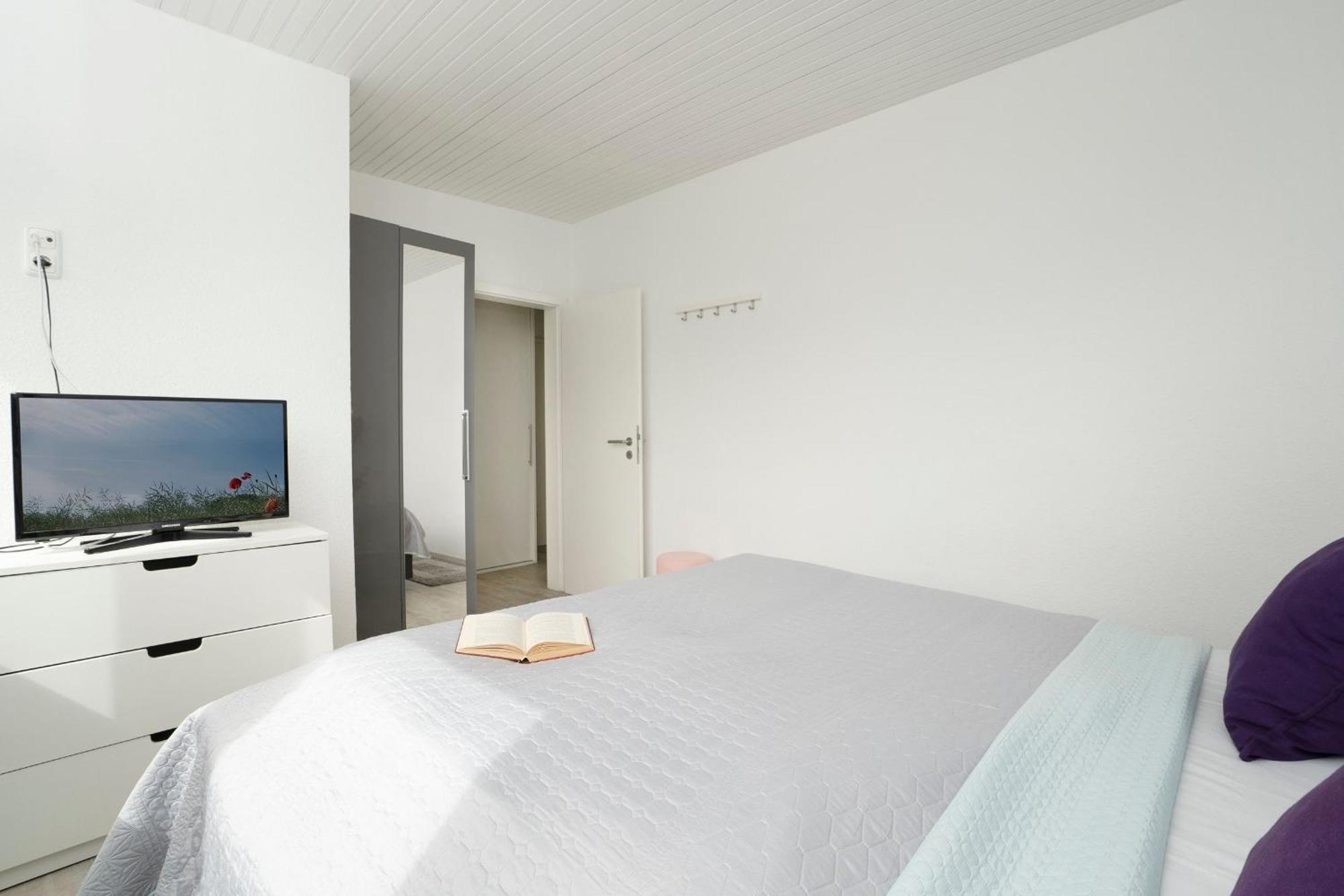 Appartement Haus Waldfrieden Ferienhaeuschen Waldfrieden à Haffkrug Extérieur photo