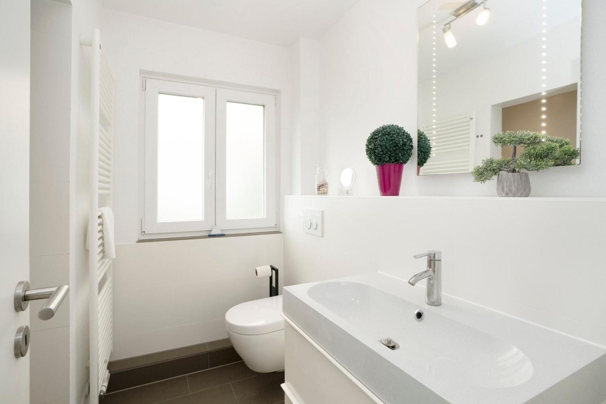 Appartement Haus Waldfrieden Ferienhaeuschen Waldfrieden à Haffkrug Extérieur photo